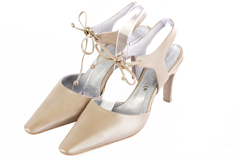 Gold women's open back shoes, with an instep strap. Tapered toe. High slim heel. Front view - Florence KOOIJMAN